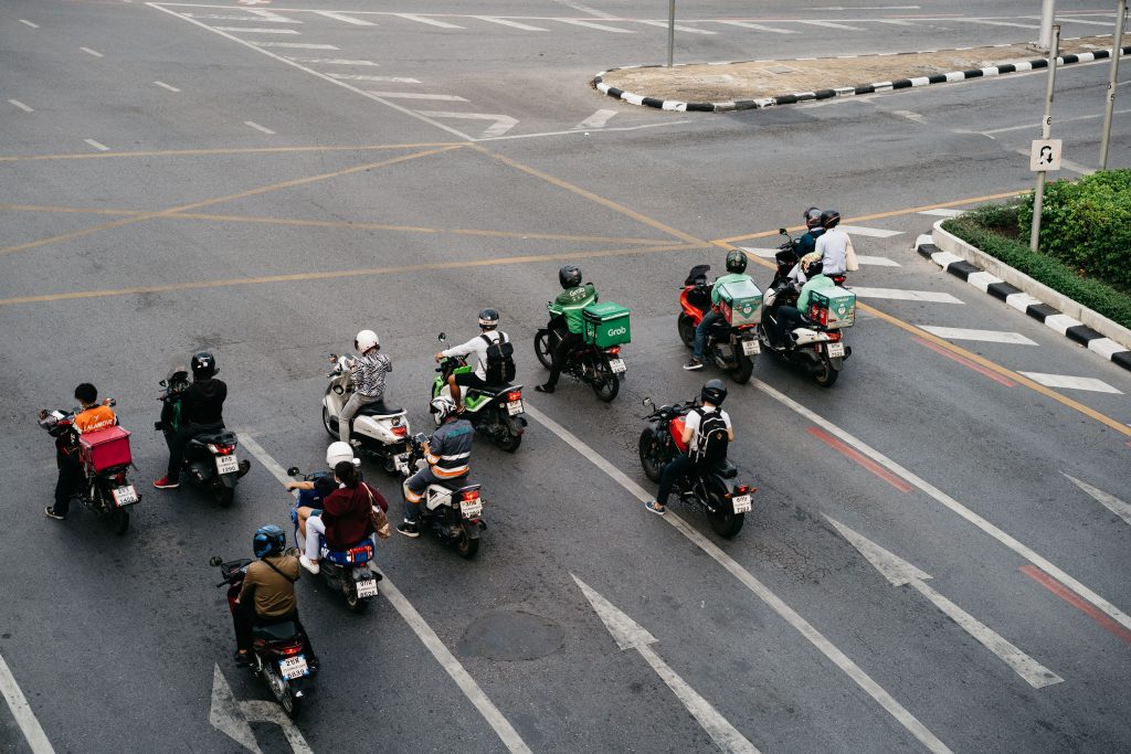pexels photo 12100418 12100418 Aerial view of motorcyclists at an intersection in a city.